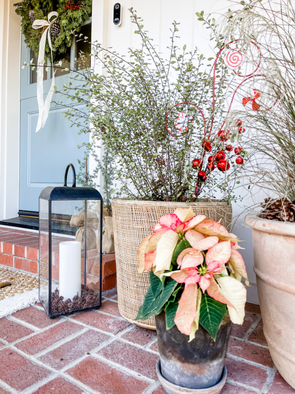 Front porch decorated for Christmas.
