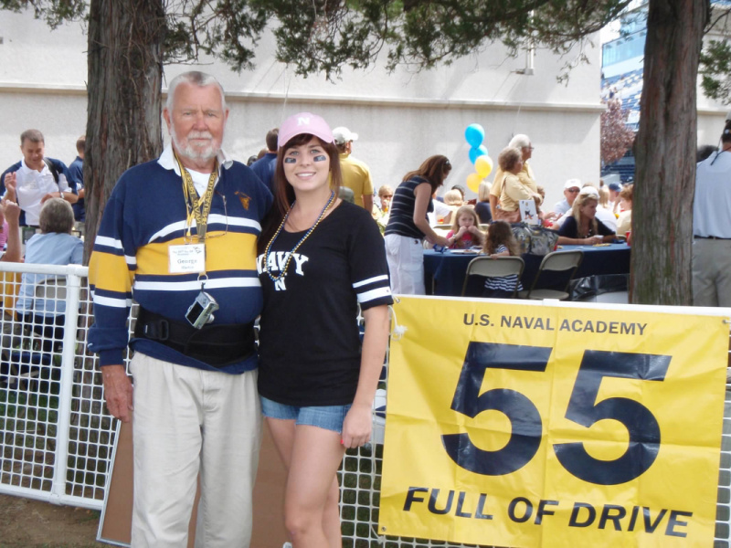 Grandpa and granddaughter at Navy game.