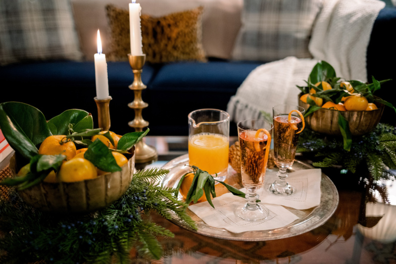 Chandon Garden Spritz poured into glasses with orange rind.