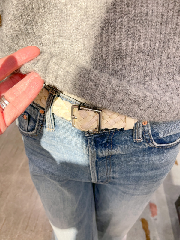 Woven white belt on manequin.