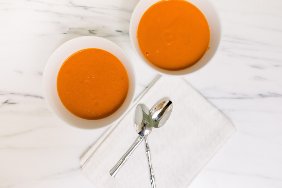 Two bowls of tomato soup.