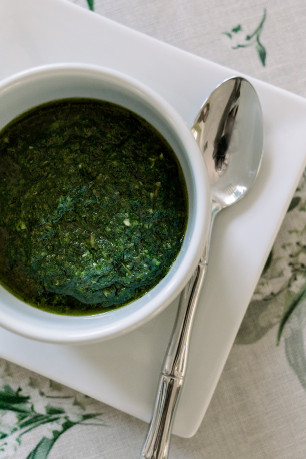 Salsa Verde in small bowl with spoon.
