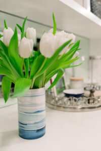 Tulips in blue and white vase.