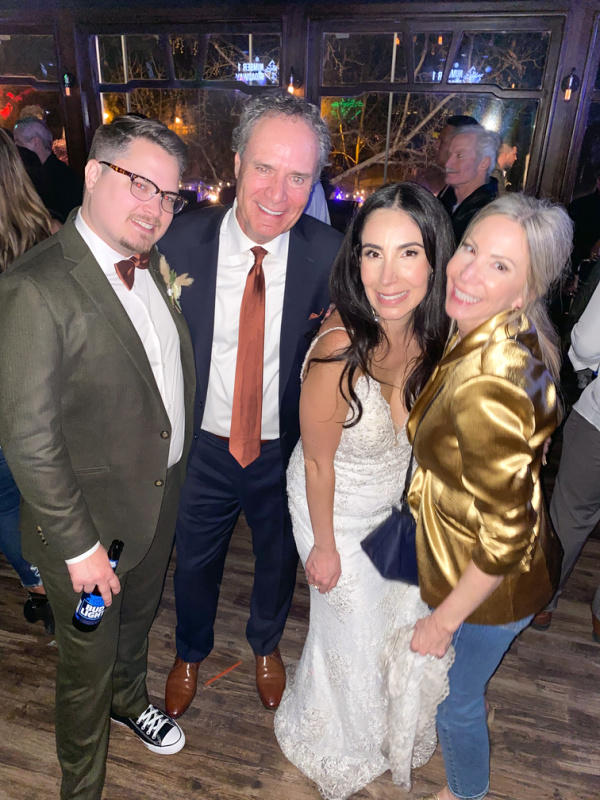 Wedding afterparty, bride, groom and parents.