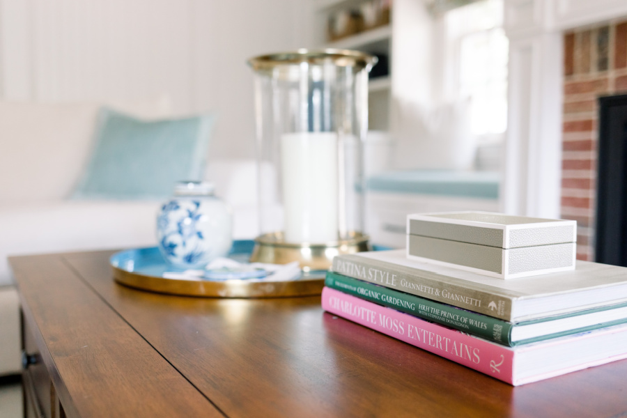 Coffee table top with tray and books.
