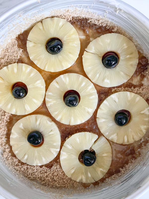 Preparing pan for Pineapple Upside Down Cake.