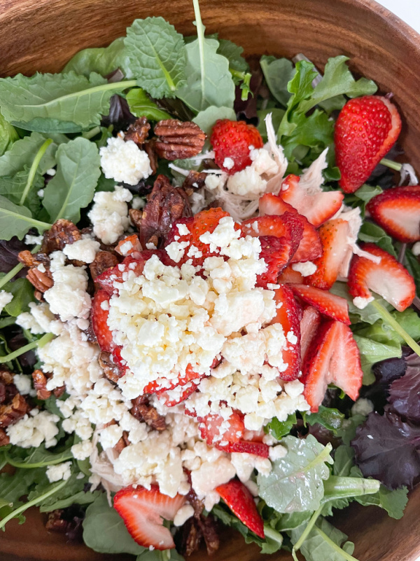 Spring Salad in bowl before tossing.