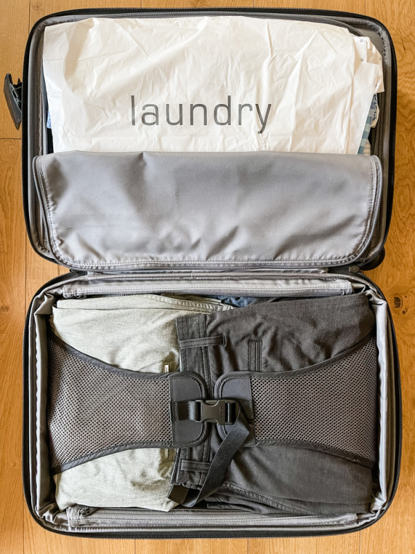 Packed carry on suitcase.