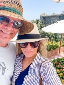 Couple taking selfie on beach in Mexico.
