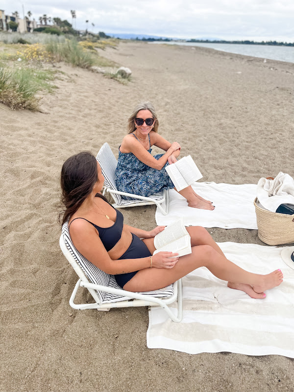 Two woman chatting on the Bach.
