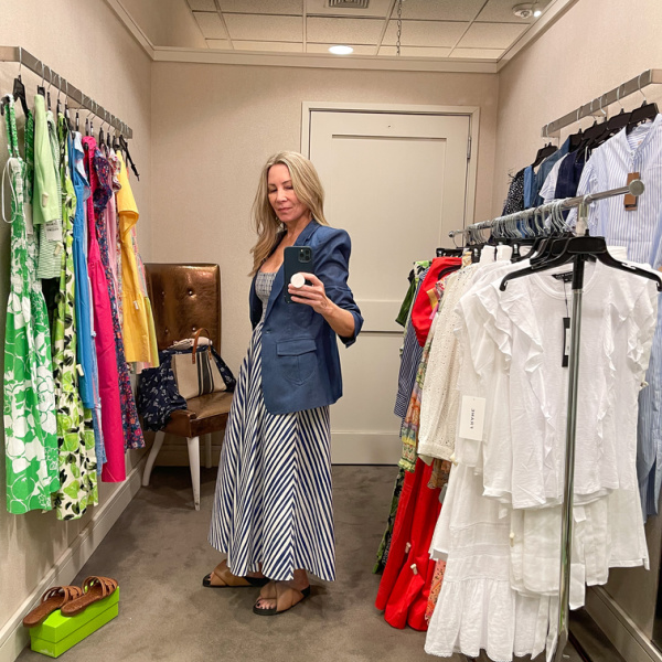 Woman wearing La Ligna dress in Nordstrom dressing room.