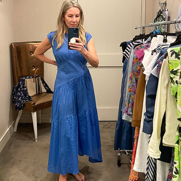 Woman wearing Frame dress in Nordstrom dressing room.