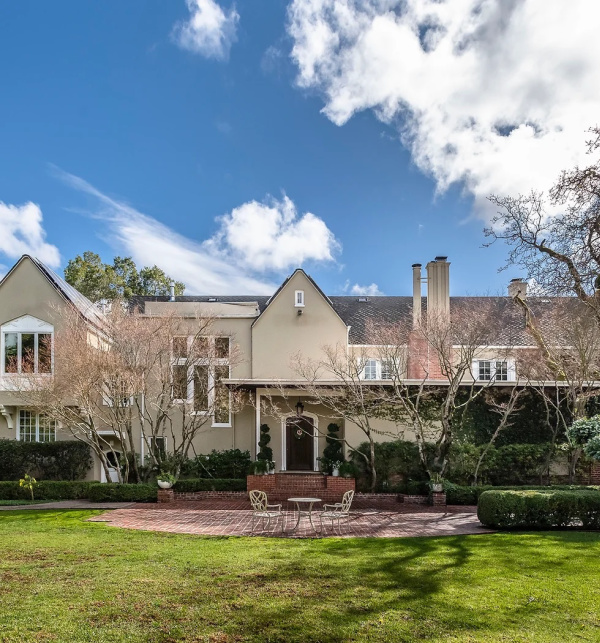 Exterior of a large, Tudor home in San Mateo county.