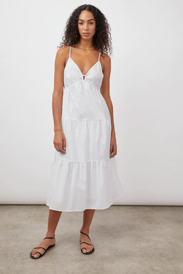 Woman wearing white Avril dress from Rails.