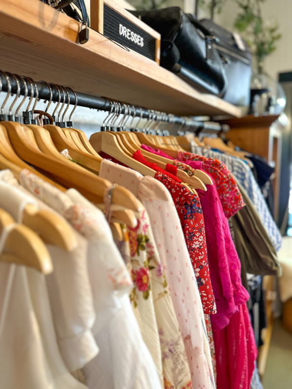 Rack of woman's dresses at ReChic store.