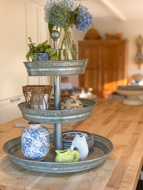 Three tiered tray on buffet counter.