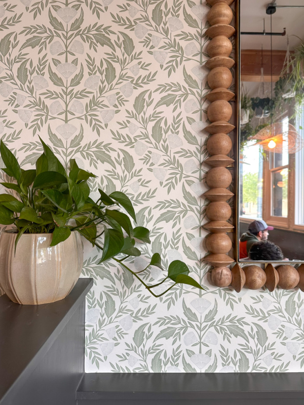 Wallpaper and mirrors edge at Cypress restaurant.