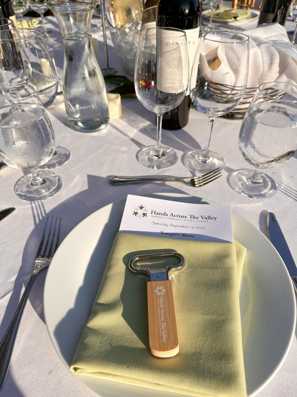 Dinner place setting at Hands Across the Valley gala.
