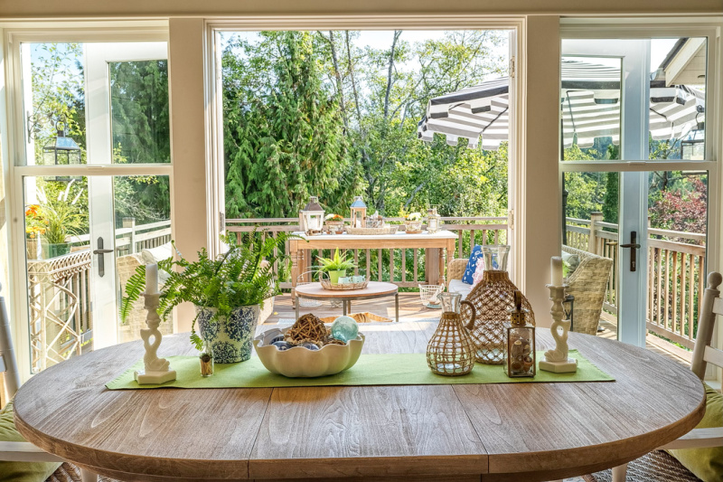 Dining room looking out to backyard view in pretty PNS island home.