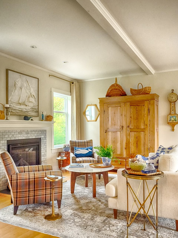 Beautiful living room setting with armoire.