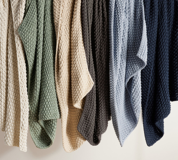 Pottery Barn throws in various colors.