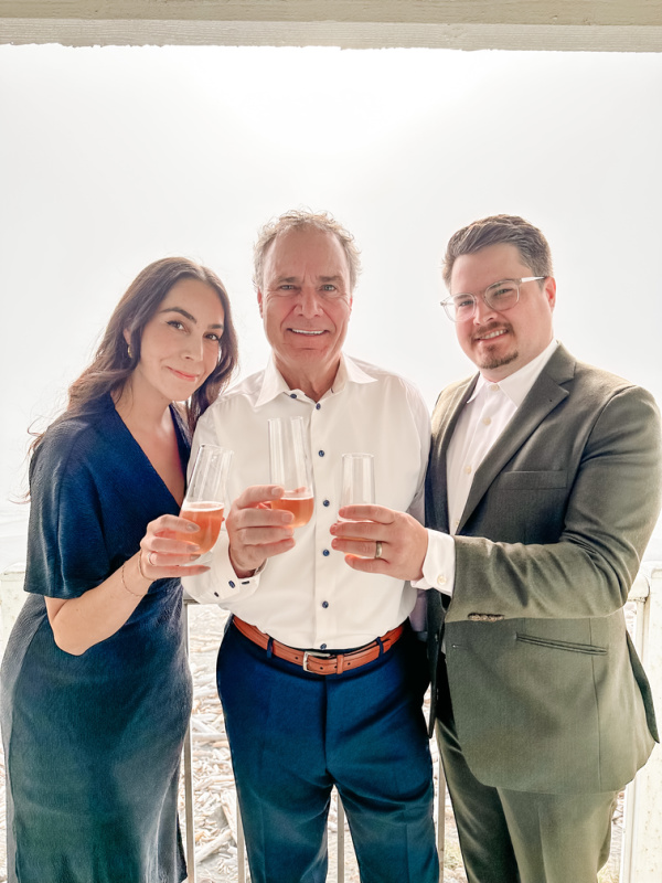 Family toasting with champagne before wedding.