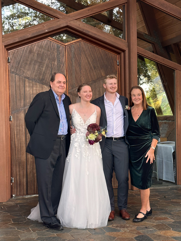 Family outside wedding chapel.