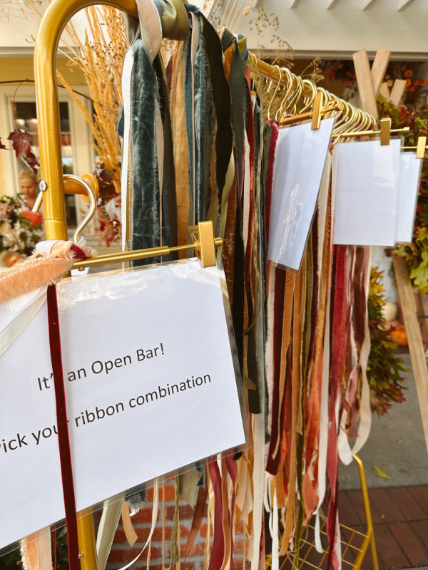 Rack of velvet ribbons for fall wreaths.
