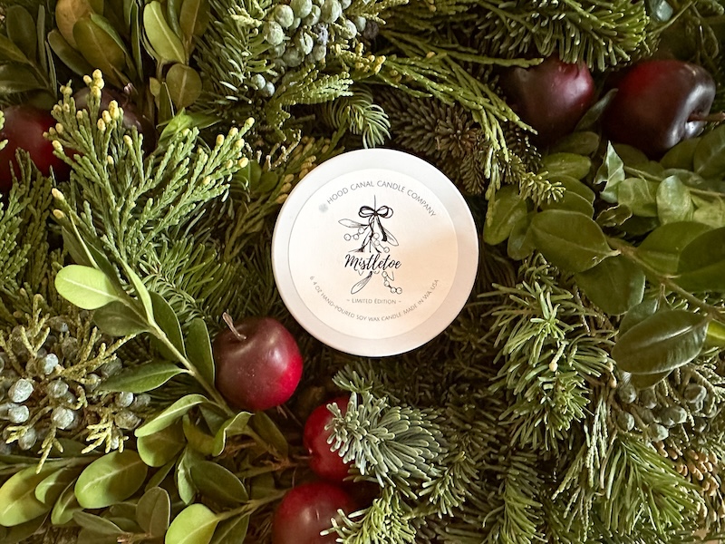 Hood Canal holiday candle in center of wreath.