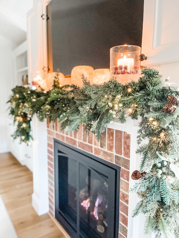 Wendy Bellissimo stone vessels on holiday mantle.