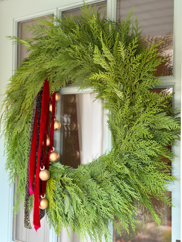 Holiday wreath on front door.