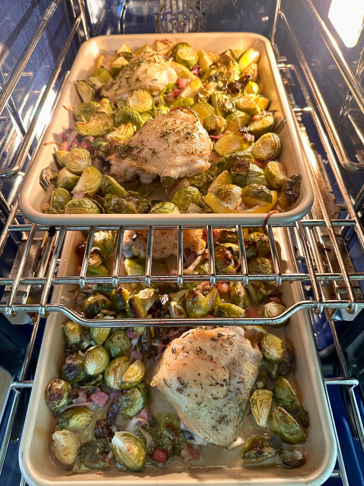 Sheet pan chicken in oven.
