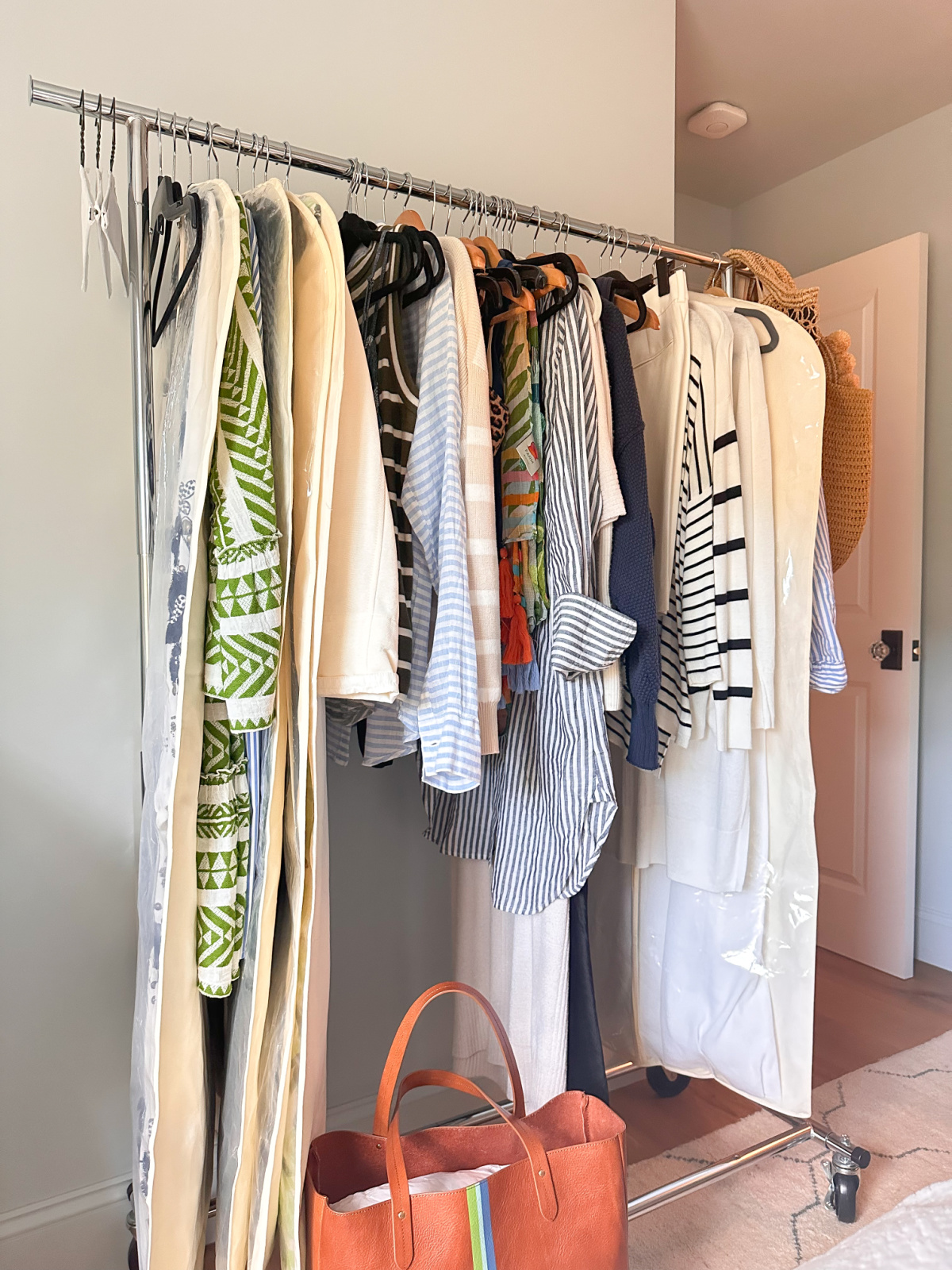 Rolling rack of clothes.