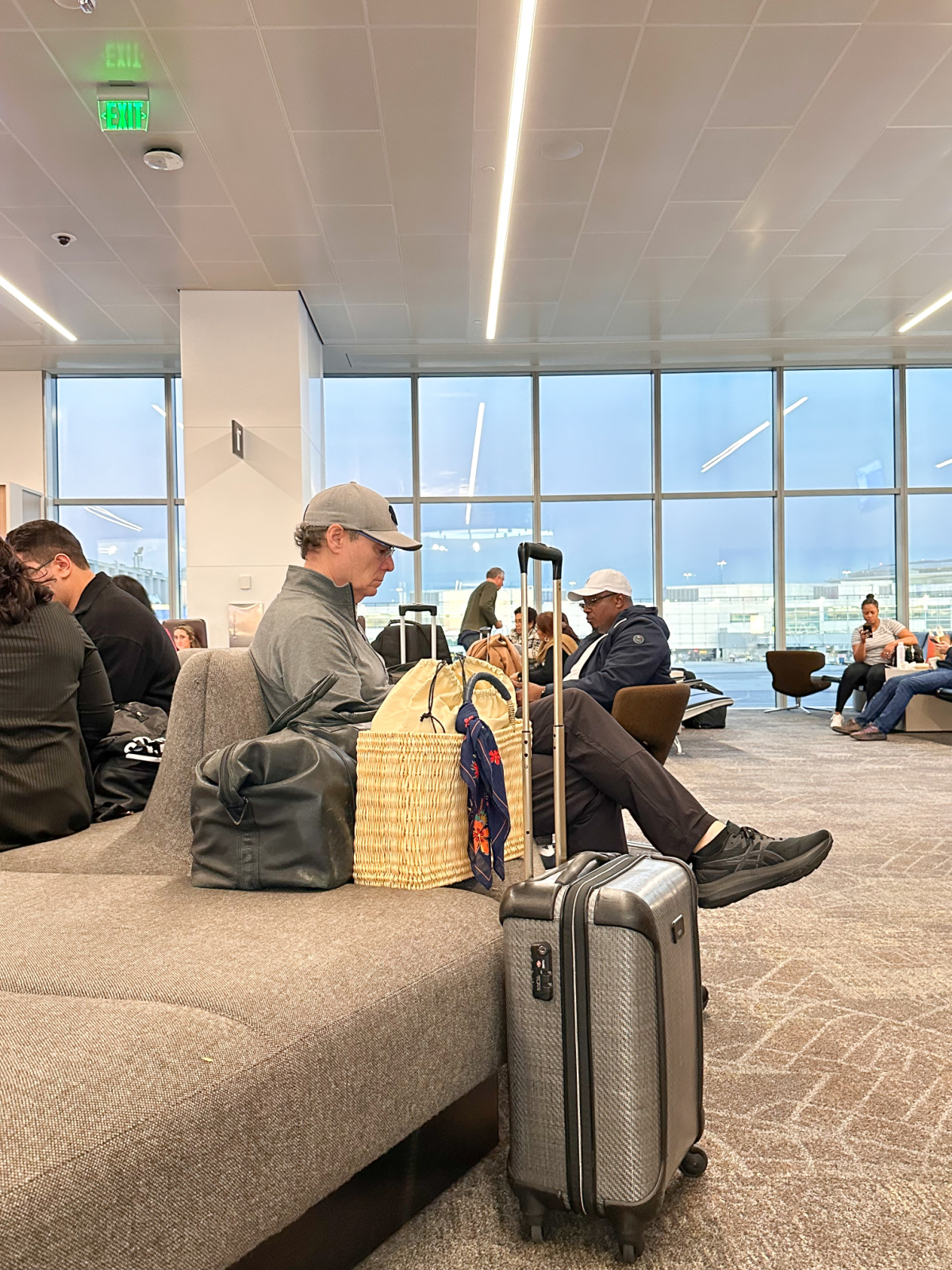 Man waiting for flight in SFO terminal.