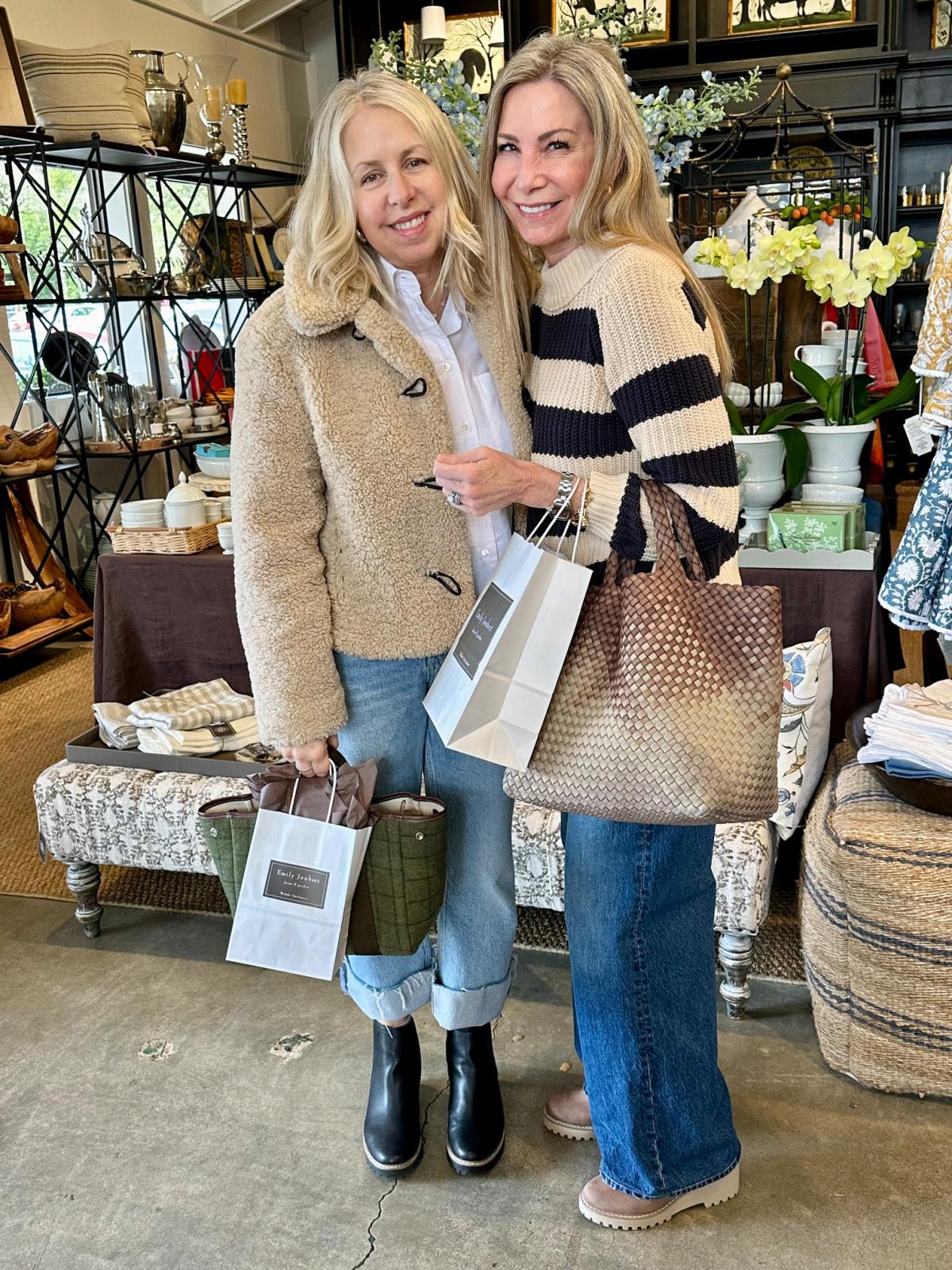 Two woman inside Emily Joubert shop.