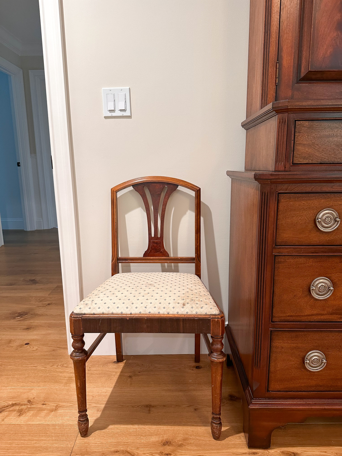 Old dining chair needing reupholstry.