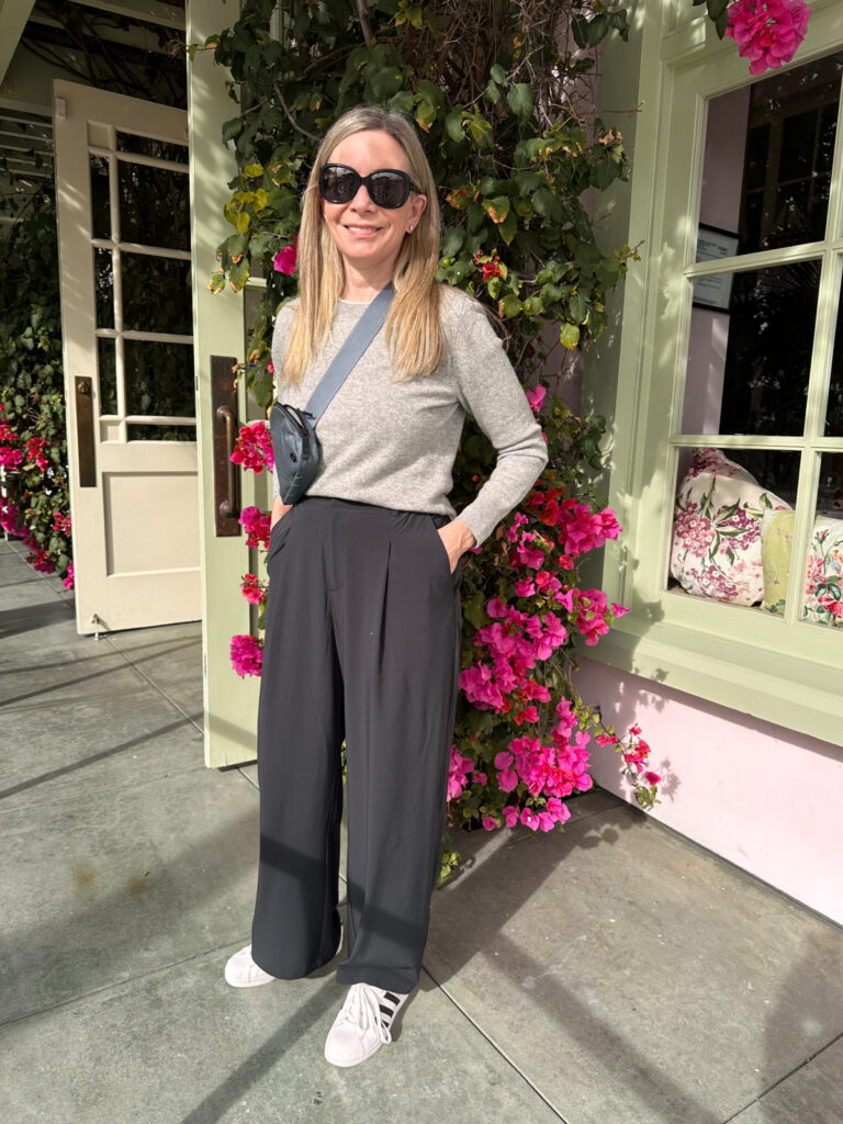 Woman standing in from of The Ivy in Santa Monica.