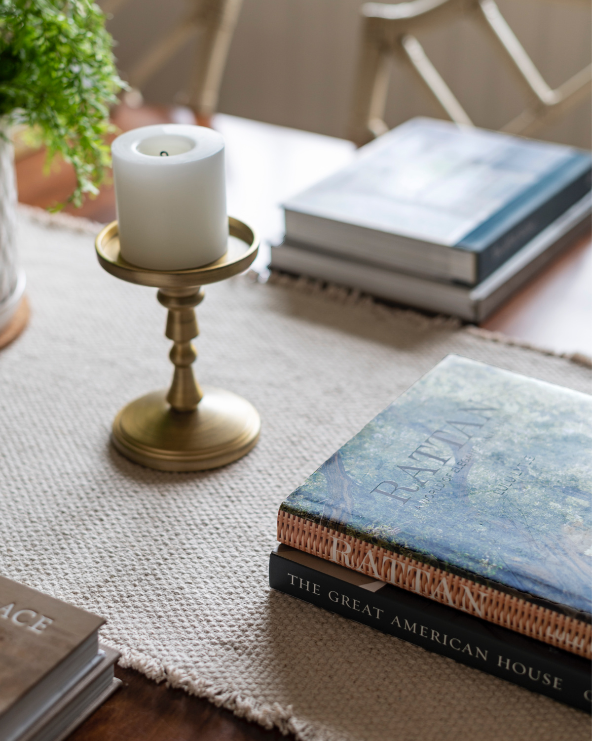 Close up of dining table set with books.