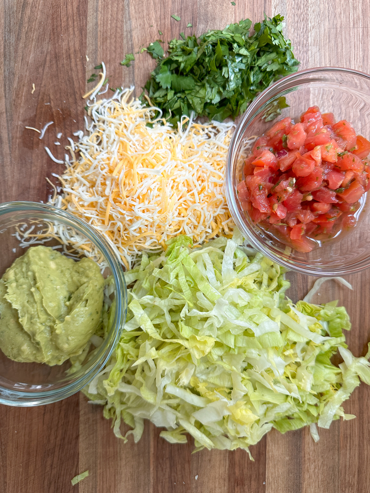 Various stages of making taquitos.