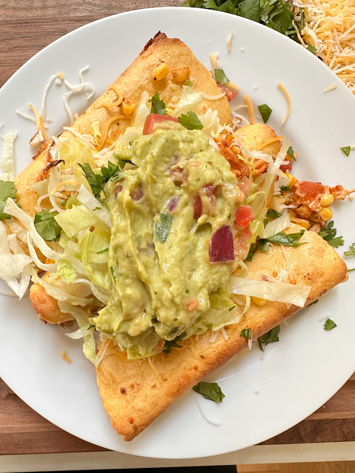 Various stages of making taquitos.