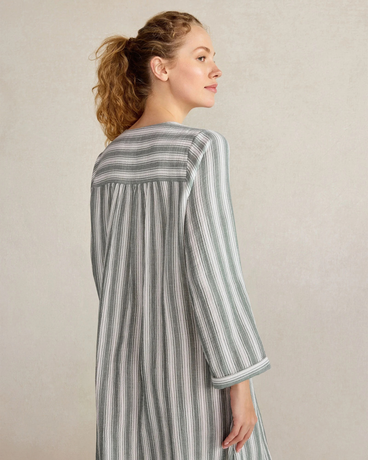 Model wearing Talbots striped caftan from back.