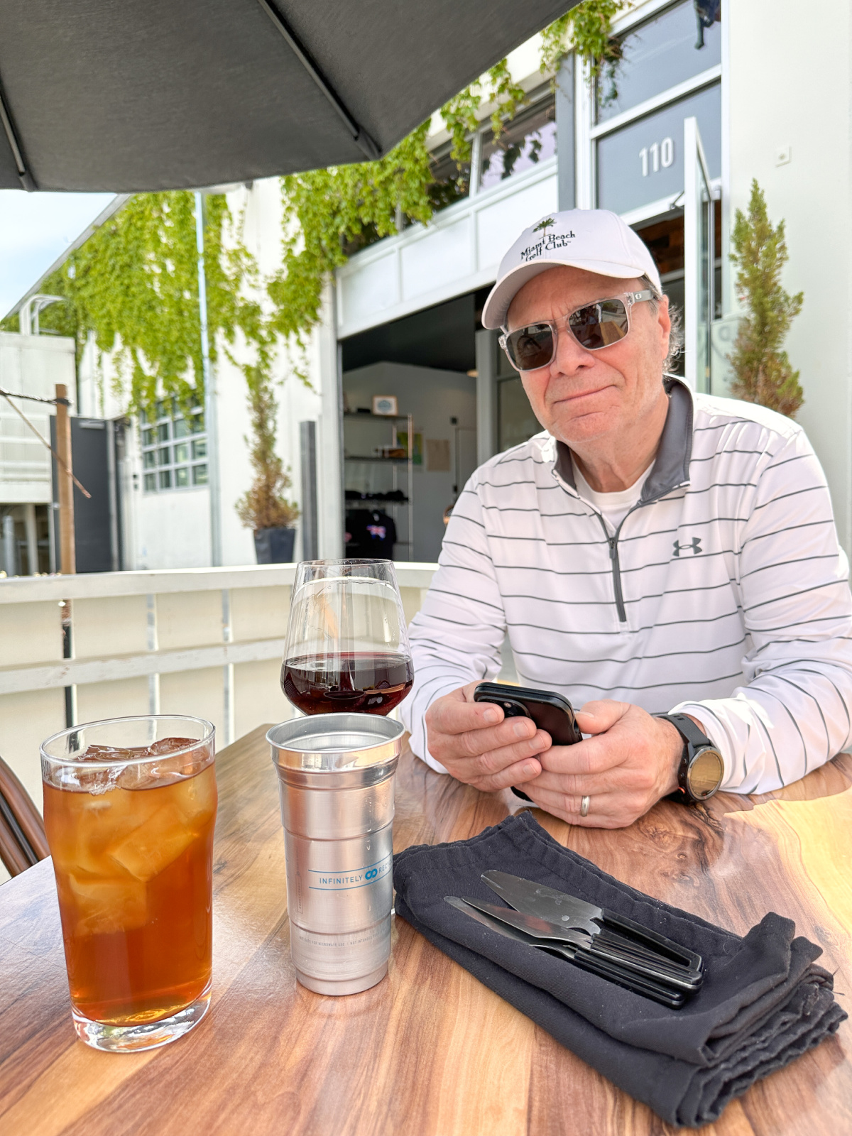 Man sitting at outdoor table at The Barlow.