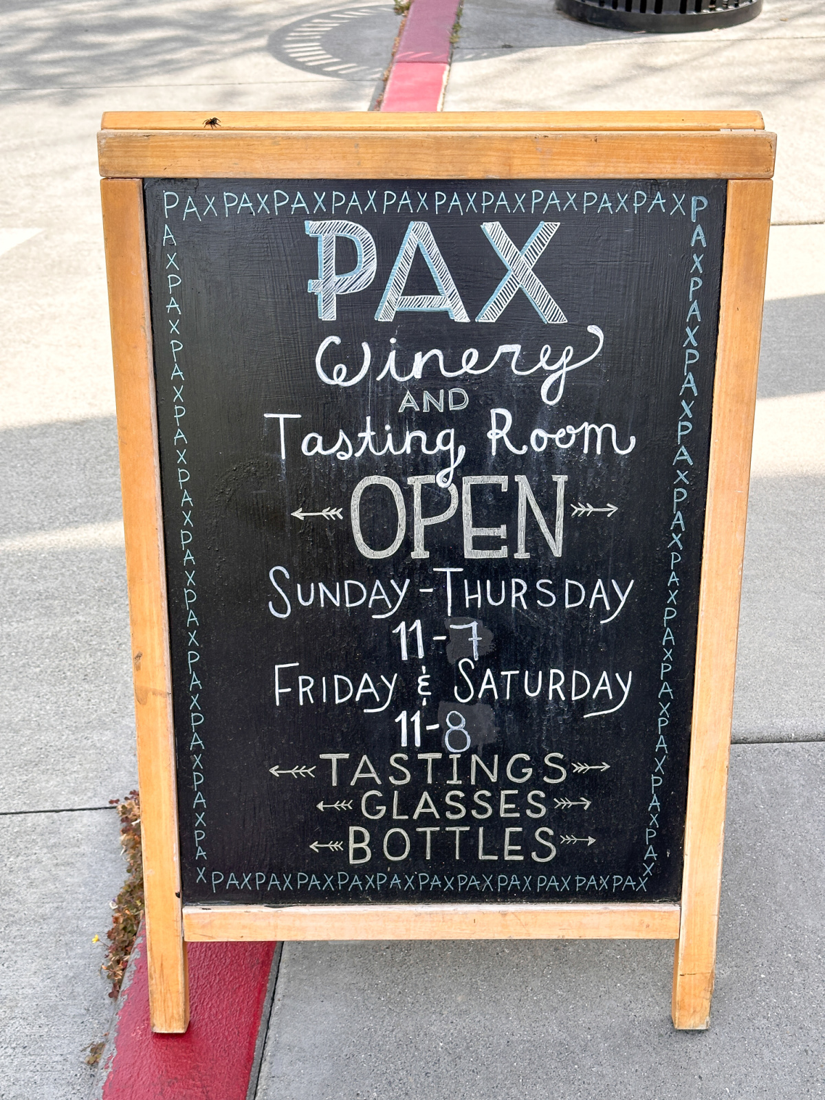 Sandwich board sign outside PAX winery in Sebastopol.