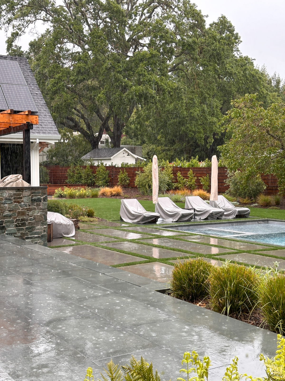 Outdoor pool deck in the rain.