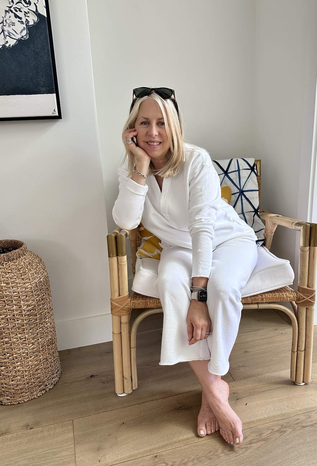 Kim from Northern California Style sitting in chair wearing a cute summer outfit.