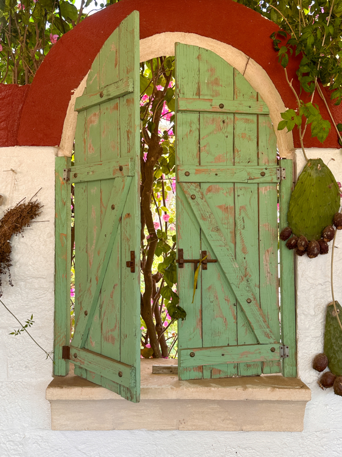 Green shutter doors at Masseria Montenapoleone.