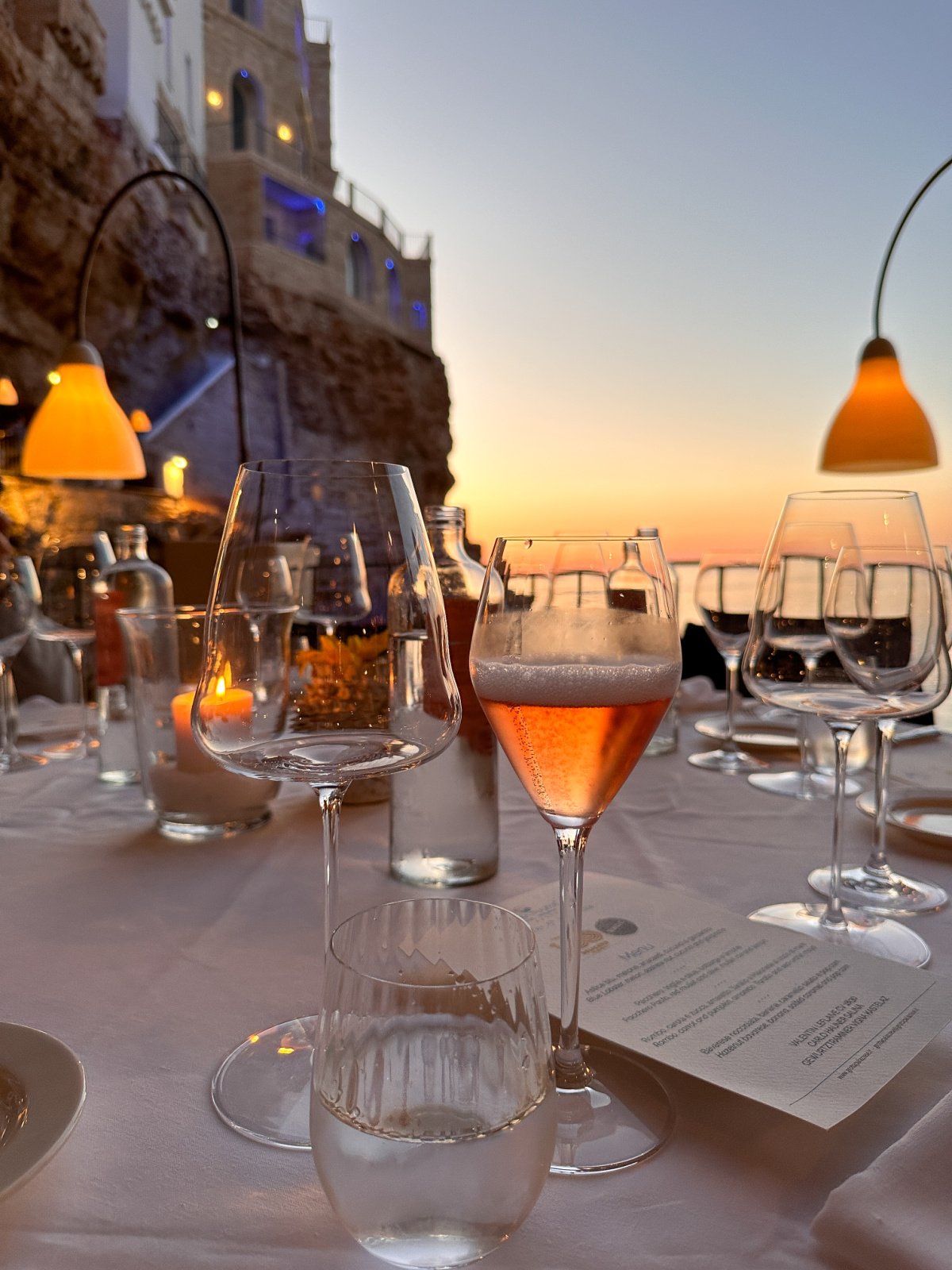 Drinks on table at Grotta Palazzese.