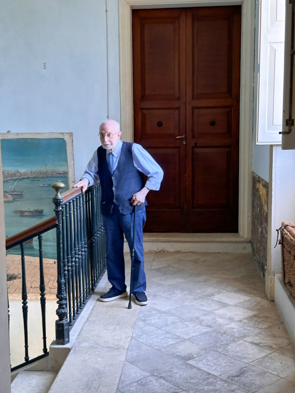 Nobleman giving tour of Palazzo Tamborino Cezzi.