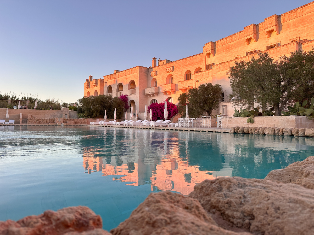Borgo Egnazia pool at sunset.
