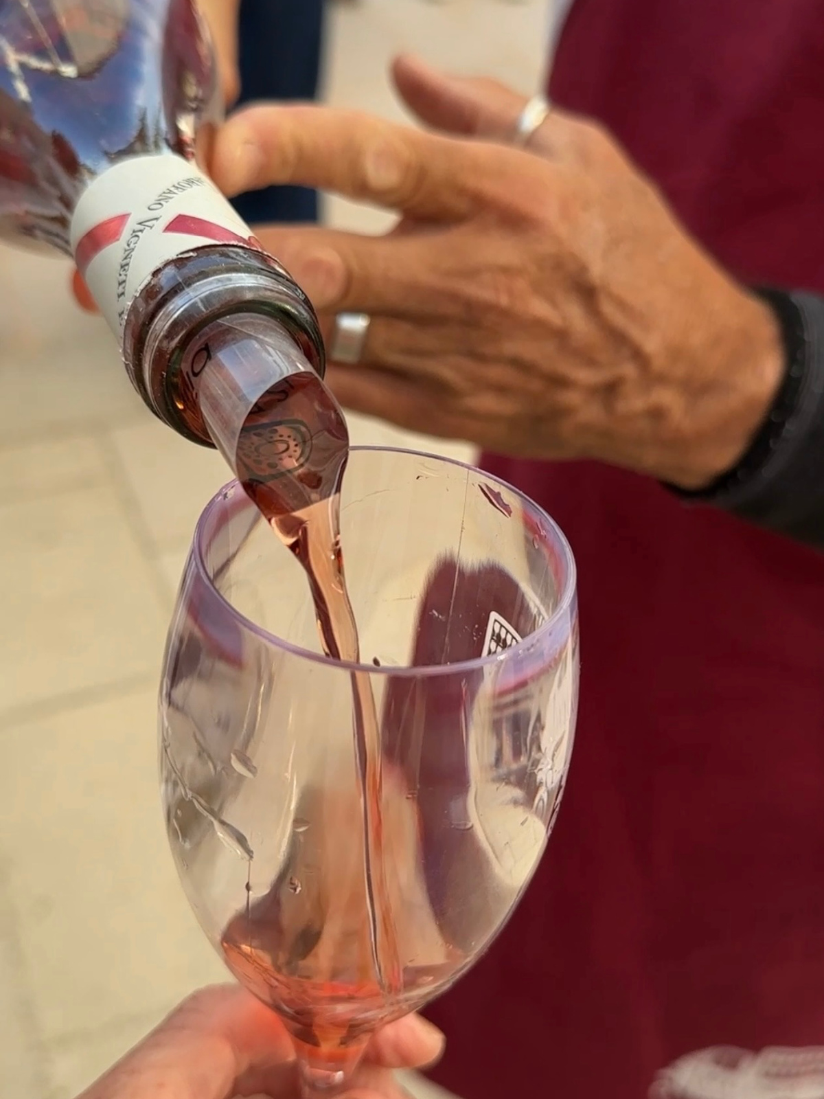 Wine being poured into glass at Masseria Papaperta.